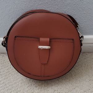 Round cognac crossbody purse